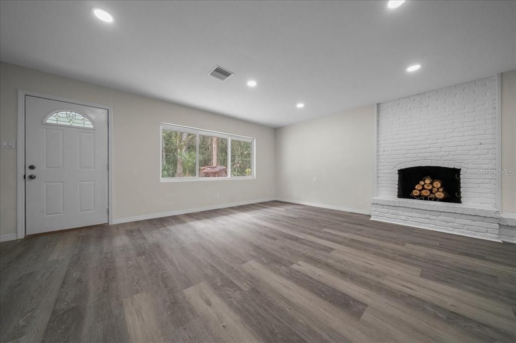 Empty room, Fireplace, Interior, Recessed Lighting, Wood Texture Flooring