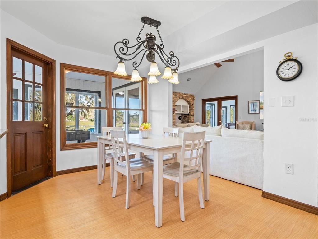 Chandelier, Dining room, Fireplace, Interior, Living room, Wood Texture Flooring