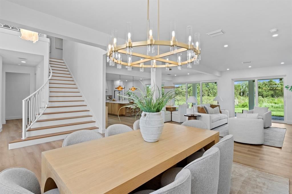 Chandelier, Dining room, Interior, Living room, Pendant Lights, Recessed Lighting, Wood Texture Flooring