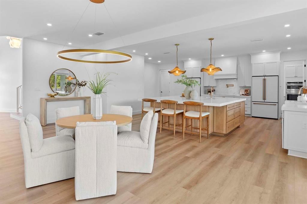 Dining room, Interior, Kitchen, Pendant Lights, Recessed Lighting, Stainless Steel Appliances, Wood Texture Flooring