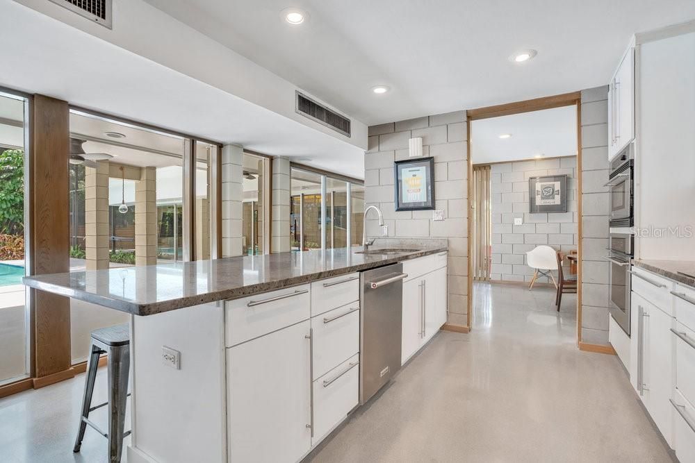 Interior, Kitchen, Recessed Lighting, Stainless Steel Appliances, Stone Walls