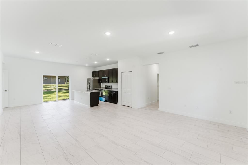 Empty room, Interior, Kitchen, Marble, Recessed Lighting, Stainless Steel Appliances