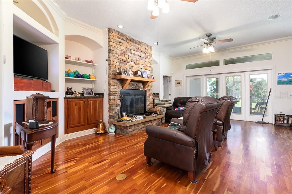 Fireplace, Interior, Recessed Lighting, Stone Walls, Wood Texture Flooring