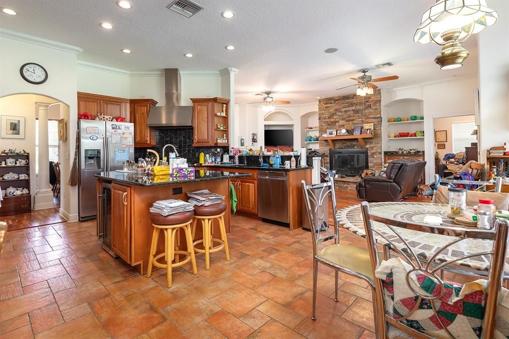 Fireplace, Interior, Kitchen, Recessed Lighting, Stone Walls