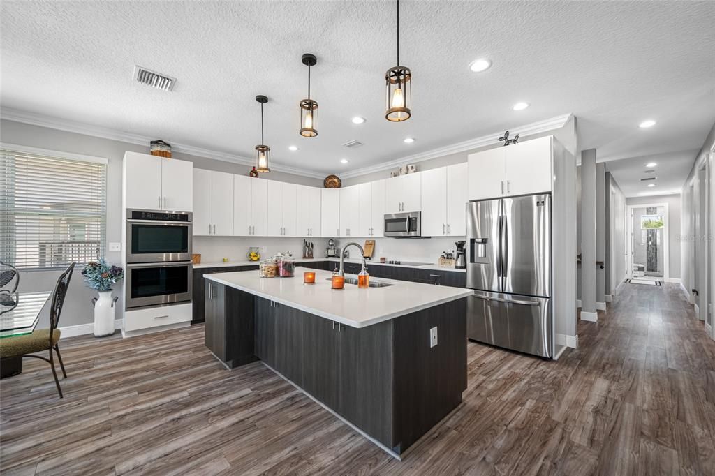 Interior, Kitchen, Pendant Lights, Recessed Lighting, Stainless Steel Appliances, Wood Texture Flooring