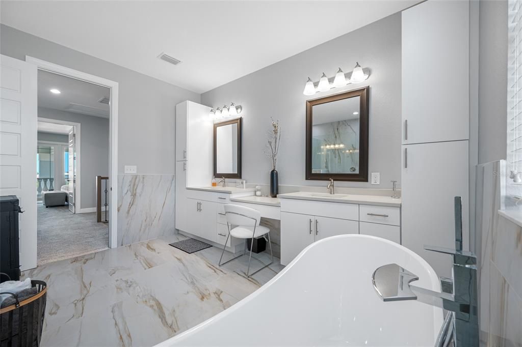 Bathroom, Dual Sink Vanities, Free Standing Baths, Interior, Marble, Marble Walls, Recessed Lighting