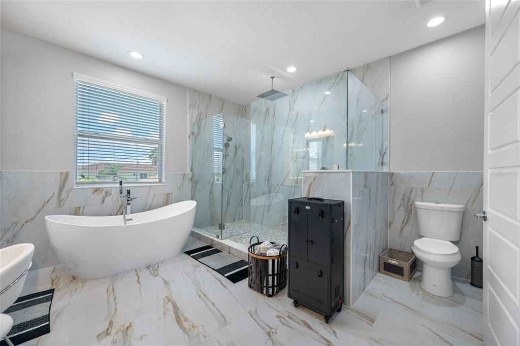 Bathroom, Free Standing Baths, Glass Shower, Interior, Marble, Marble Walls, Recessed Lighting