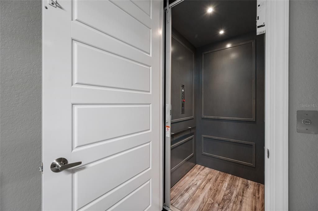 Elevator, Interior, Recessed Lighting, Wood Texture Flooring