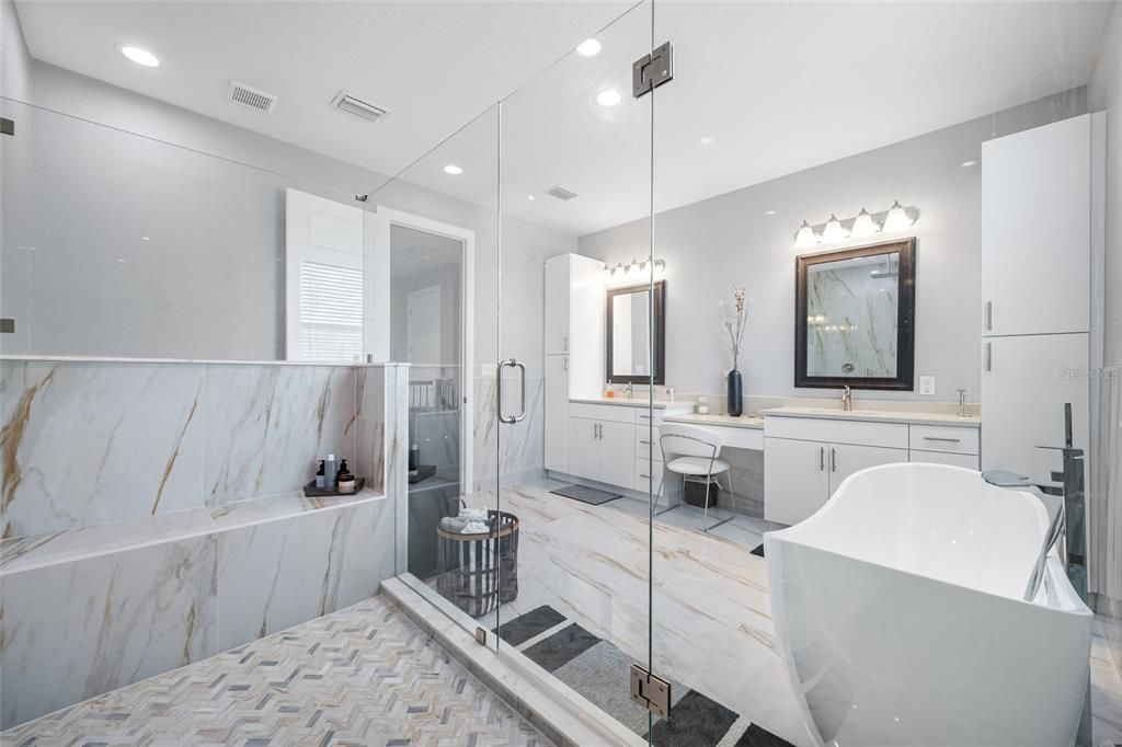 Bathroom, Free Standing Baths, Glass Shower, Interior, Marble, Marble Walls, Recessed Lighting