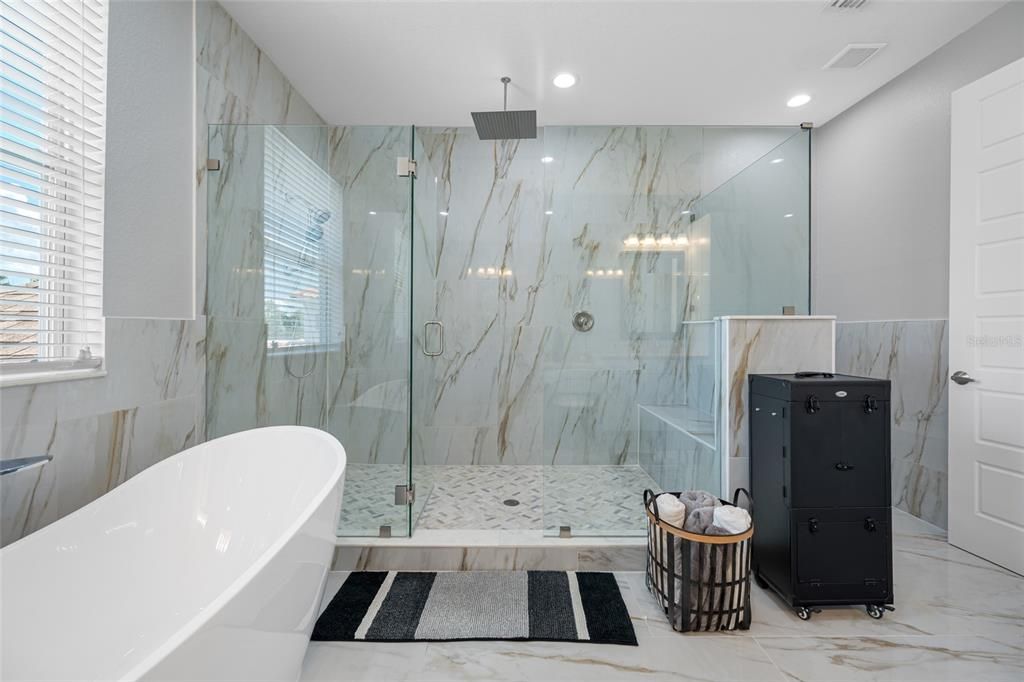 Bathroom, Free Standing Baths, Glass Shower, Interior, Marble, Marble Walls, Recessed Lighting