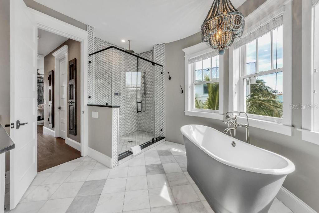 Bathroom, Chandelier, Free Standing Baths, Glass Shower, Interior, Marble, Pendant Lights, Recessed Lighting