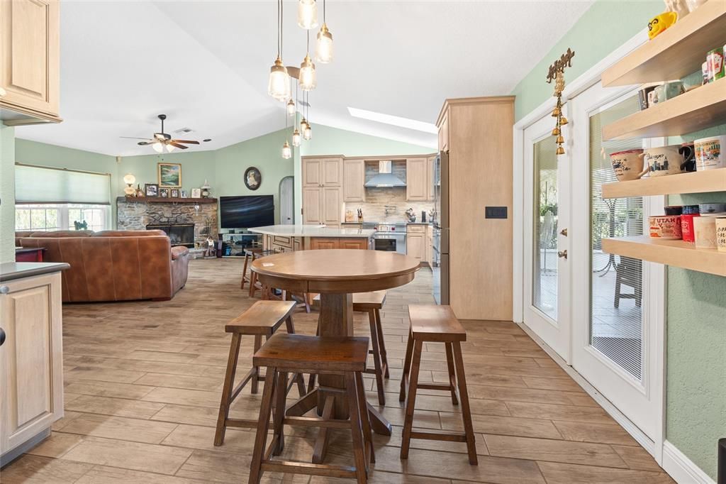 Dining room, Fireplace, Interior, Kitchen, Living room, Pendant Lights, Wood Texture Flooring