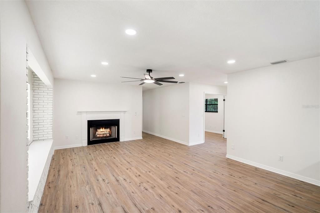 Empty room, Fireplace, Interior, Recessed Lighting, Wood Texture Flooring