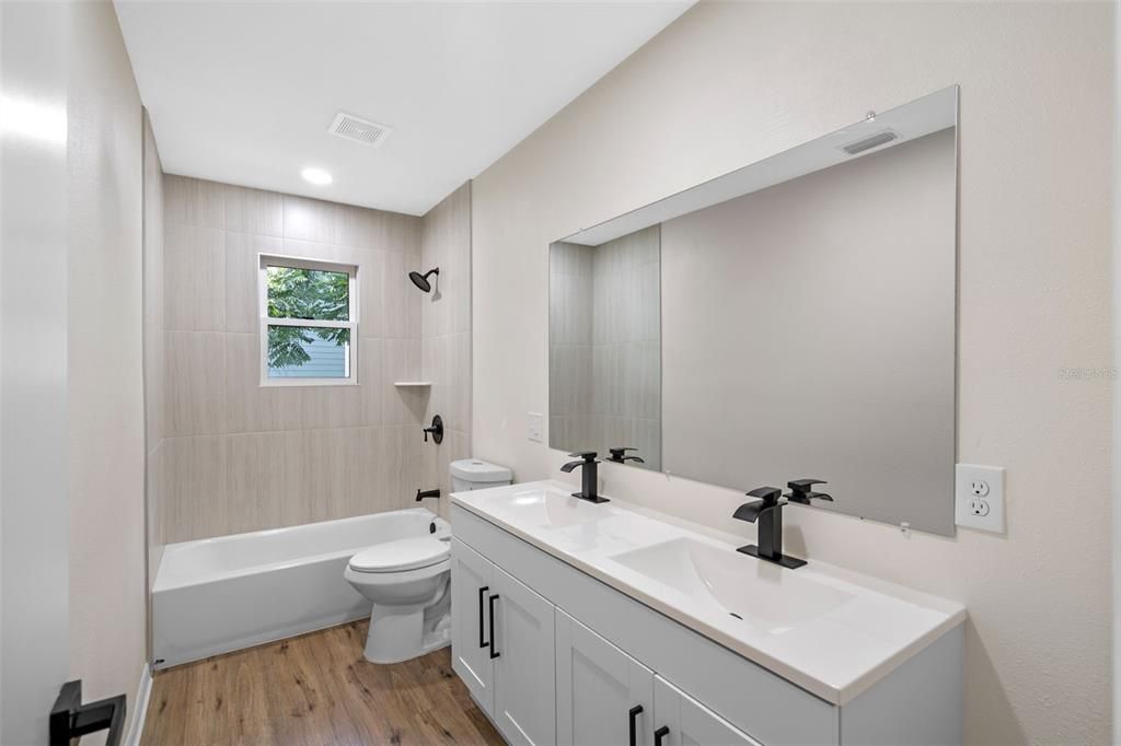 Bathroom, Dual Sink Vanities, Interior, Recessed Lighting, Wood Texture Flooring