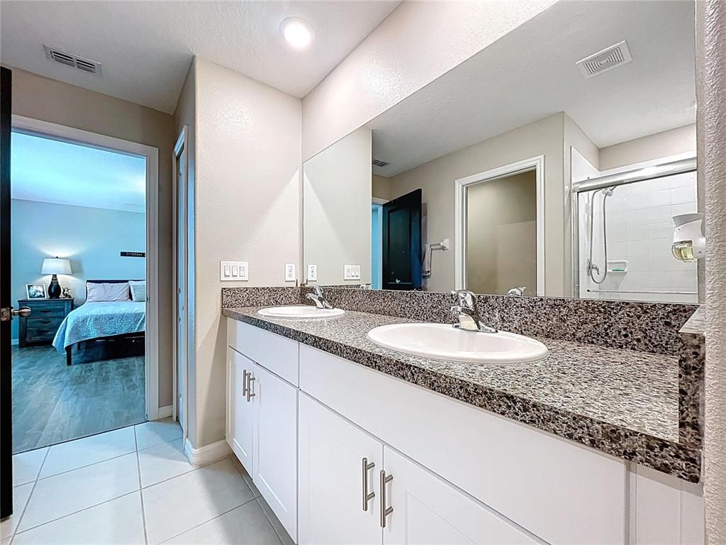 Bathroom, Bedroom, Dual Sink Vanities, Interior, Recessed Lighting, Wood Texture Flooring