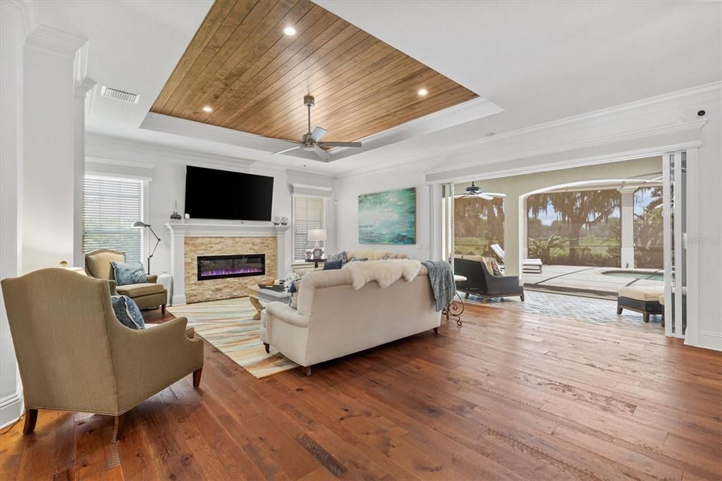 Fireplace, Interior, Living room, Recessed Lighting, Wooden Ceilings, Wood Texture Flooring