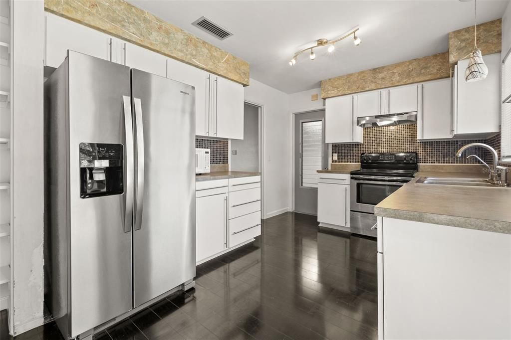 Interior, Kitchen, Pendant Lights, Stainless Steel Appliances, Wood Texture Flooring