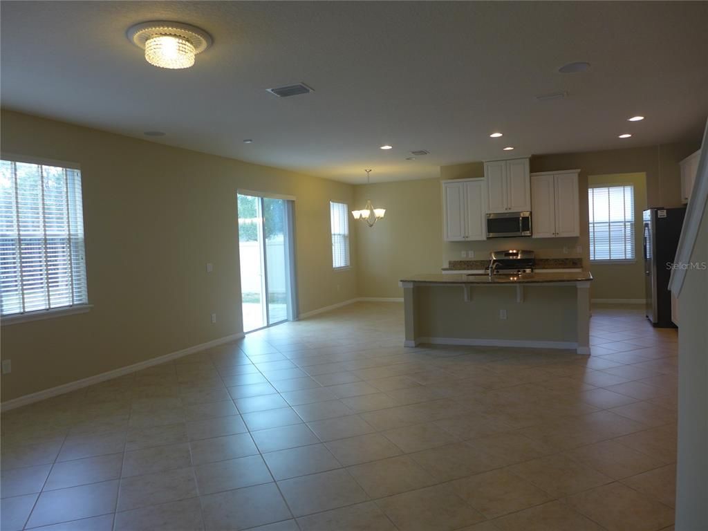 Chandelier, Empty room, Interior, Kitchen, Recessed Lighting, Stainless Steel Appliances