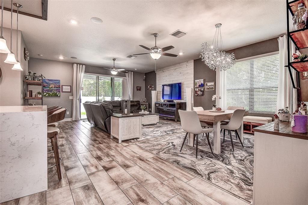 Chandelier, Dining room, Interior, Living room, Pendant Lights, Recessed Lighting, Wood Texture Flooring