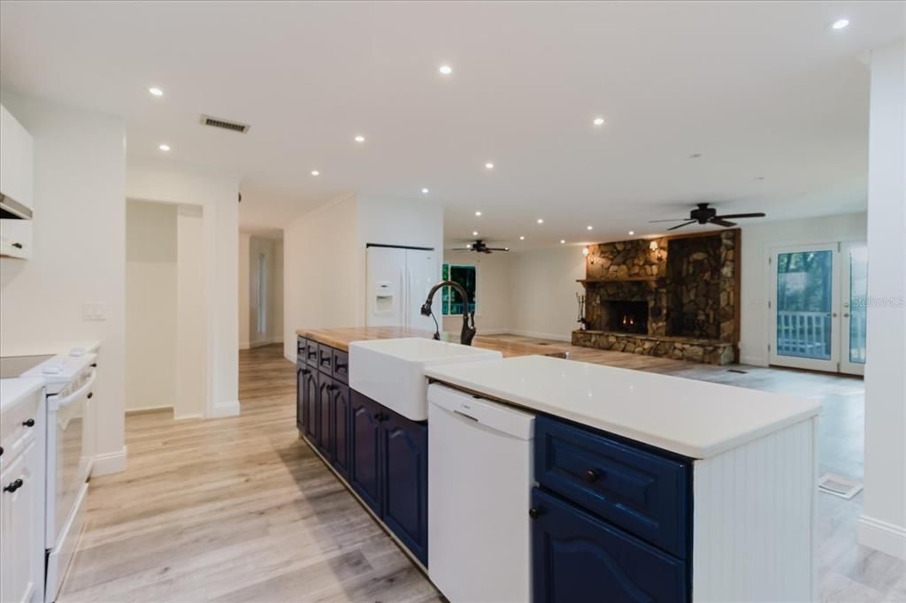 Fireplace, Interior, Kitchen, Recessed Lighting, Wood Texture Flooring