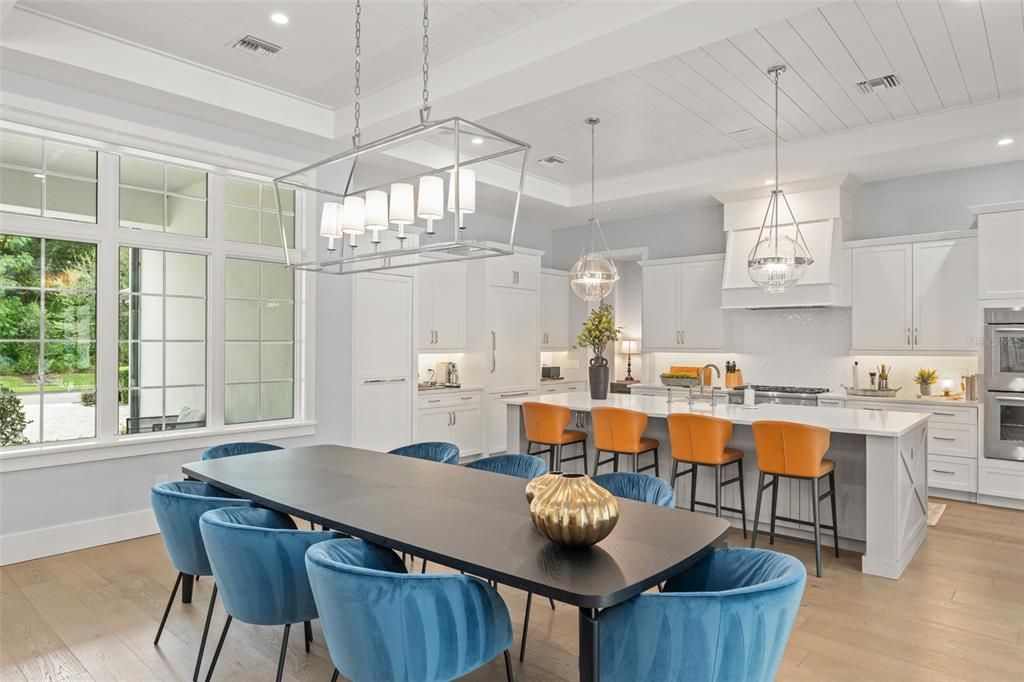 Dining room, Interior, Kitchen, Pendant Lights, Recessed Lighting, Stainless Steel Appliances, Wood Texture Flooring