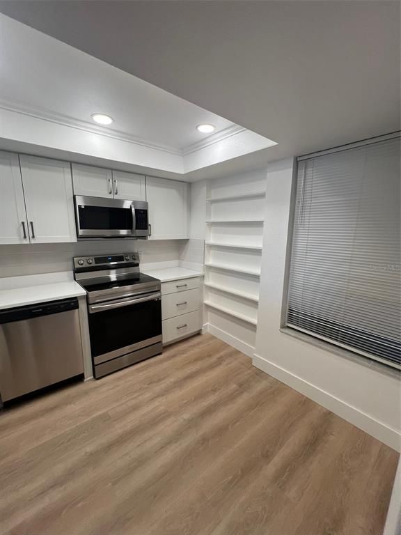 Interior, Kitchen, Recessed Lighting, Stainless Steel Appliances, Wood Texture Flooring