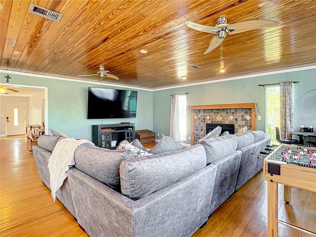 Fireplace, Interior, Living room, Recessed Lighting, Wooden Ceilings, Wood Texture Flooring
