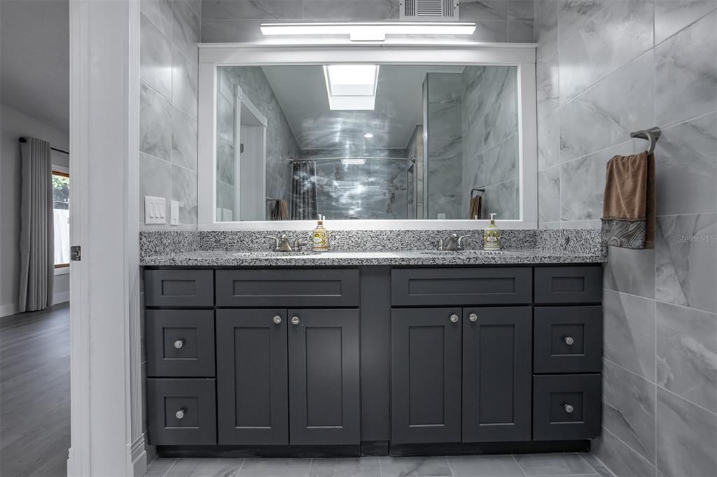 Bathroom, Dual Sink Vanities, Interior, Marble Walls, Wood Texture Flooring