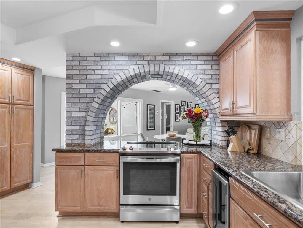 Interior, Kitchen, Recessed Lighting, Stainless Steel Appliances, Stone Walls, Wood Texture Flooring