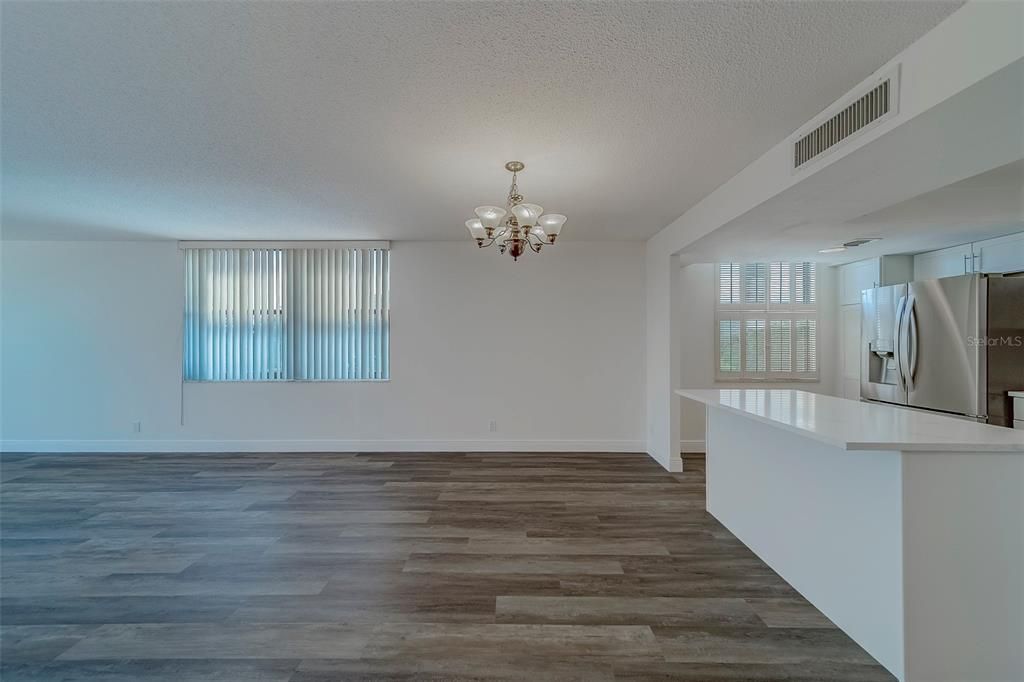 Chandelier, Empty room, Interior, Kitchen, Stainless Steel Appliances, Wood Texture Flooring