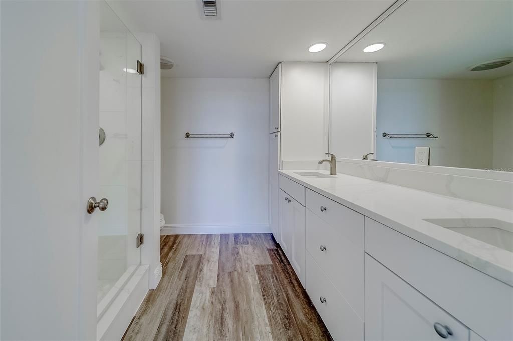 Bathroom, Dual Sink Vanities, Interior, Recessed Lighting, Wood Texture Flooring