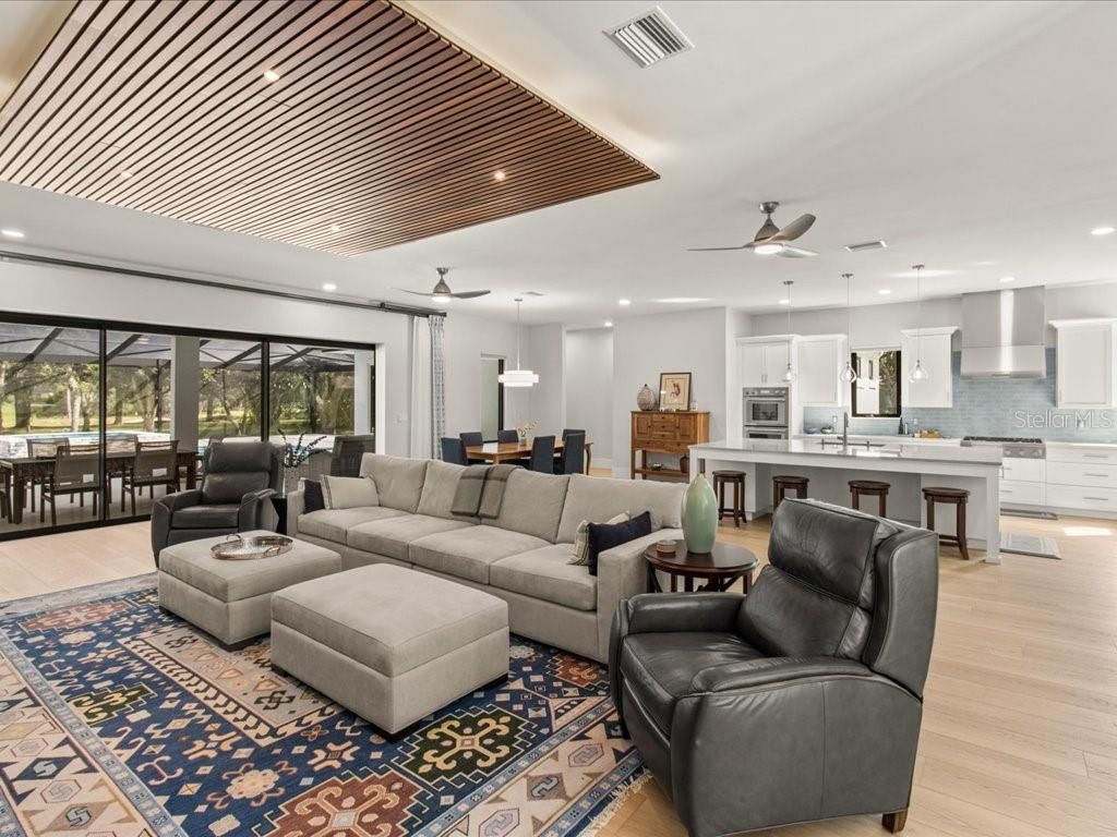 Dining room, Interior, Kitchen, Living room, Pendant Lights, Recessed Lighting, Stainless Steel Appliances, Wood Texture Flooring