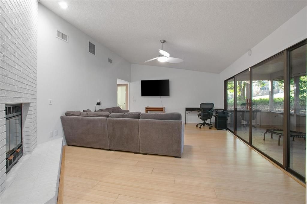 Fireplace, Home Office, Interior, Living room, Recessed Lighting, Wood Texture Flooring