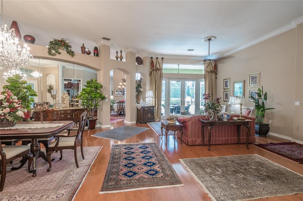 Chandelier, Dining room, Fireplace, Interior, Living room, Pendant Lights, Wood Texture Flooring