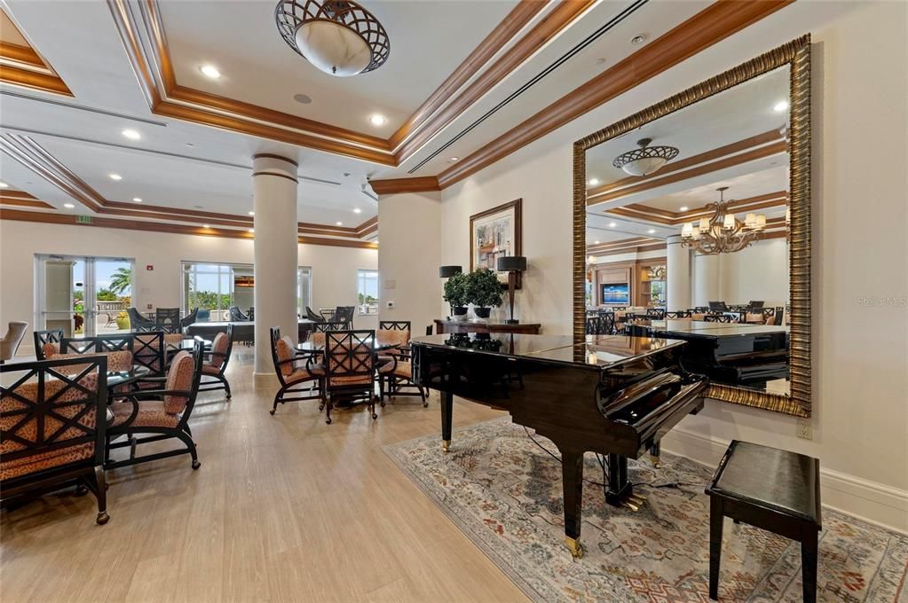 Chandelier, Dining room, Fireplace, Interior, Living room, Piano, Recessed Lighting, Wood Texture Flooring