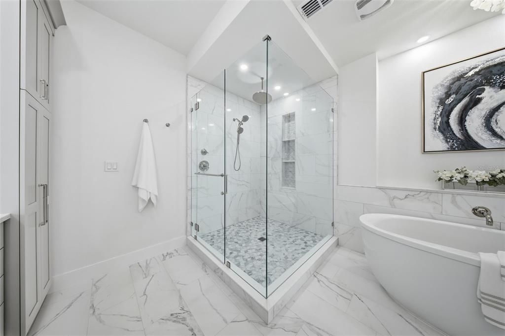 Bathroom, Free Standing Baths, Glass Shower, Interior, Marble, Marble Walls, Recessed Lighting