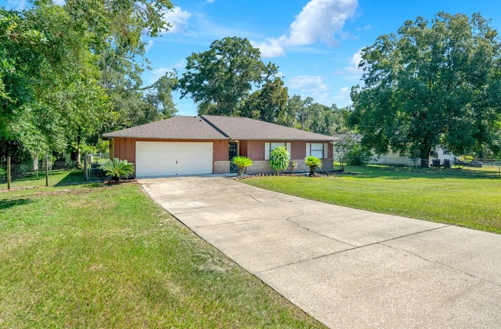 Attached, Backyard, Exterior, Facade, Brick Facade, Ranch