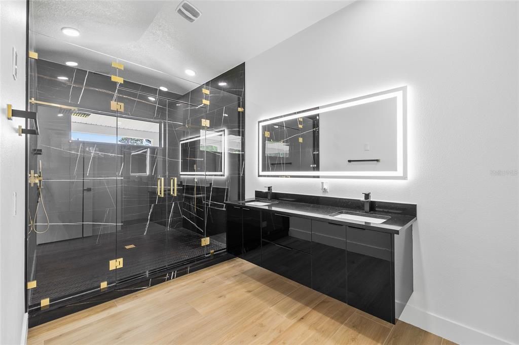 Bathroom, Dual Sink Vanities, Glass Shower, Interior, Recessed Lighting, Wood Texture Flooring