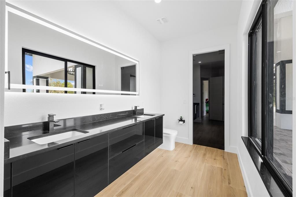 Bathroom, Dual Sink Vanities, Interior, Recessed Lighting, Wood Texture Flooring