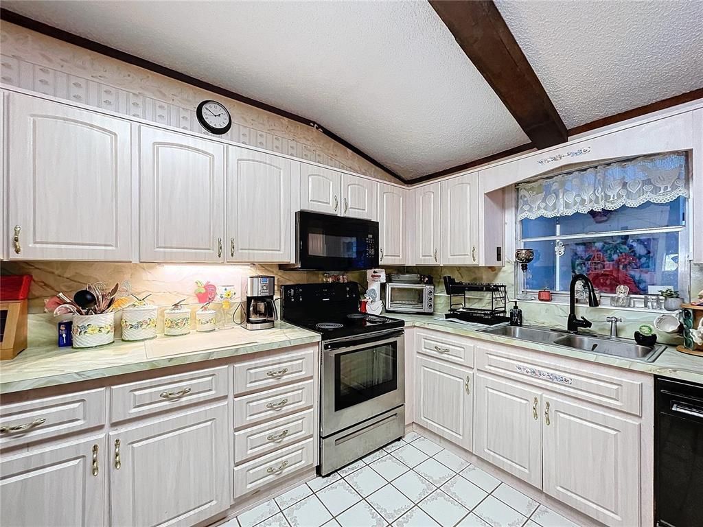 Interior, Kitchen, Tile Countertops, Wooden Beams