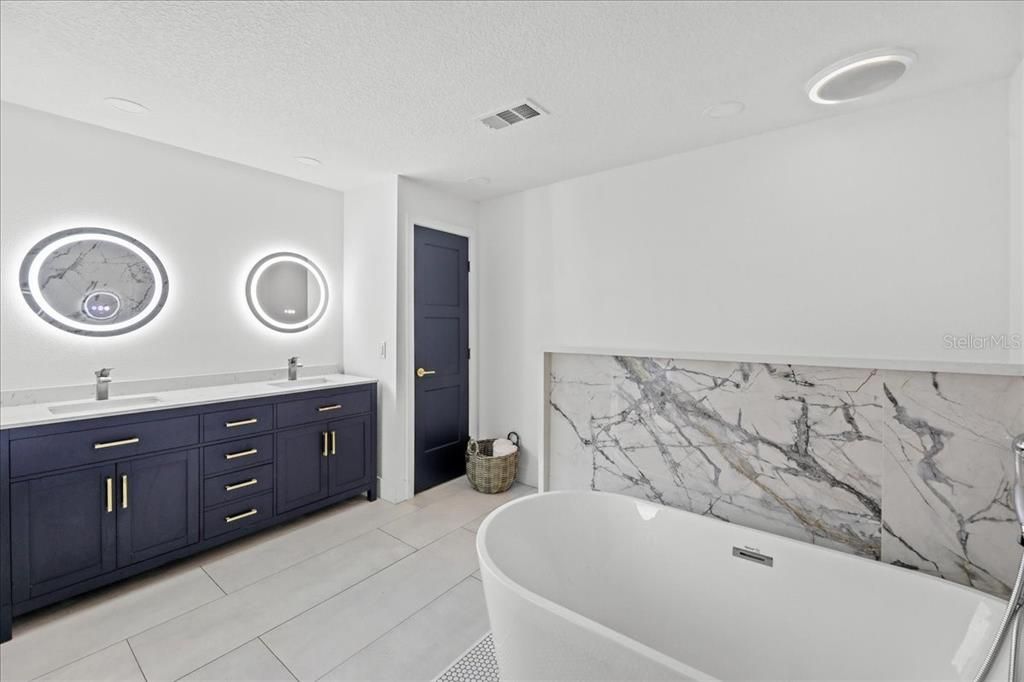 Bathroom, Dual Sink Vanities, Free Standing Baths, Interior, Marble Walls, Recessed Lighting