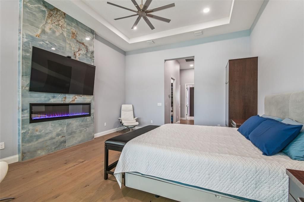 Bedroom, Fireplace, Interior, Recessed Lighting, Wood Texture Flooring