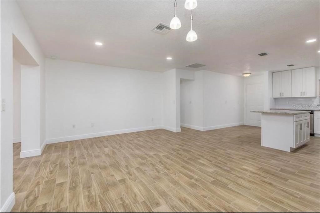 Empty room, Interior, Kitchen, Pendant Lights, Recessed Lighting, Wood Texture Flooring