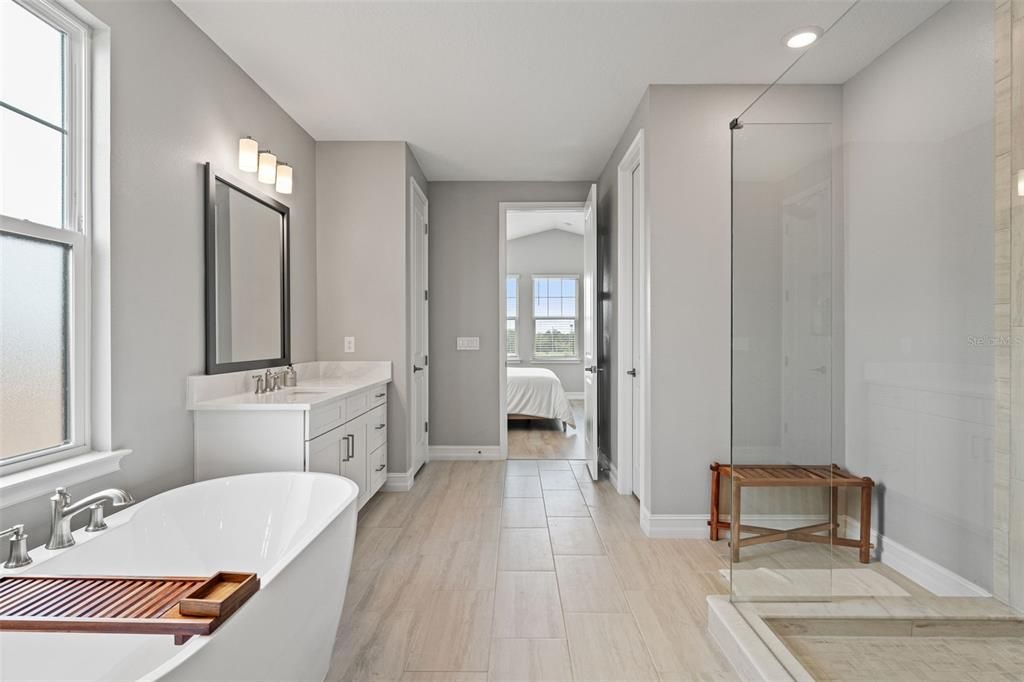 Bathroom, Bedroom, Dual Sink Vanities, Free Standing Baths, Interior, Recessed Lighting, Wood Texture Flooring