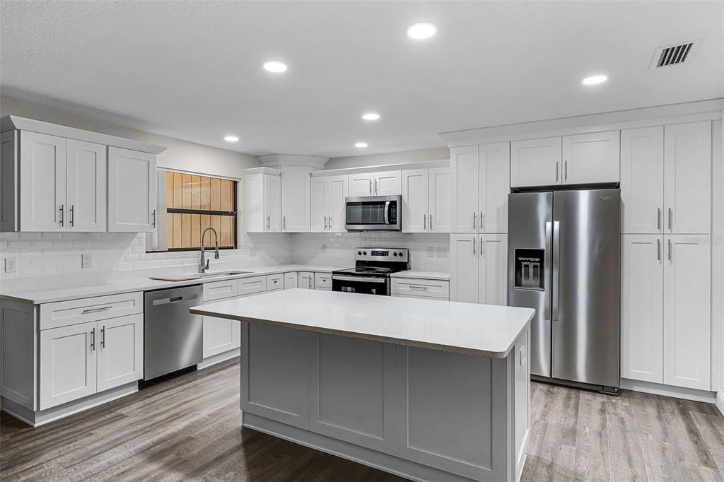 Interior, Kitchen, Recessed Lighting, Stainless Steel Appliances, Wood Texture Flooring