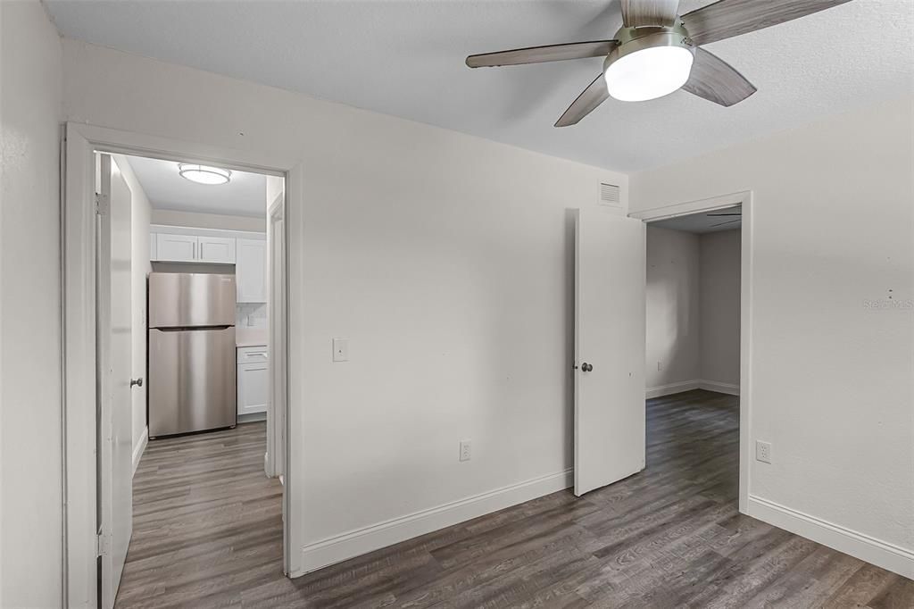 Empty room, Interior, Kitchen, Stainless Steel Appliances, Wood Texture Flooring