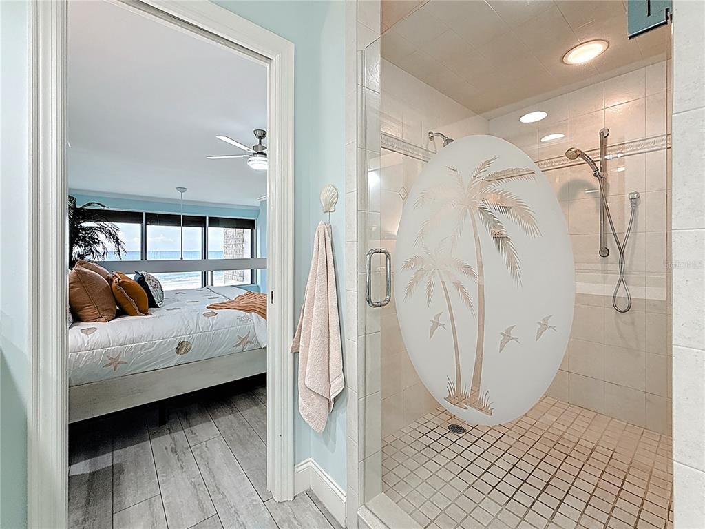 Bathroom, Bedroom, Glass Shower, Interior, Recessed Lighting, Water, Wood Texture Flooring