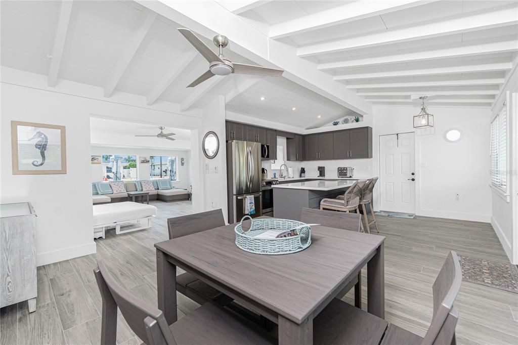 Dining room, Interior, Kitchen, Living room, Pendant Lights, Recessed Lighting, Stainless Steel Appliances, Wood Texture Flooring