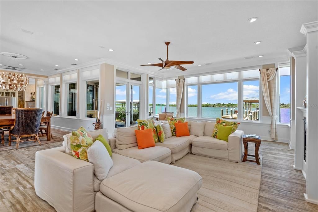 Chandelier, Dining room, Interior, Living room, Recessed Lighting, Water, Wood Texture Flooring