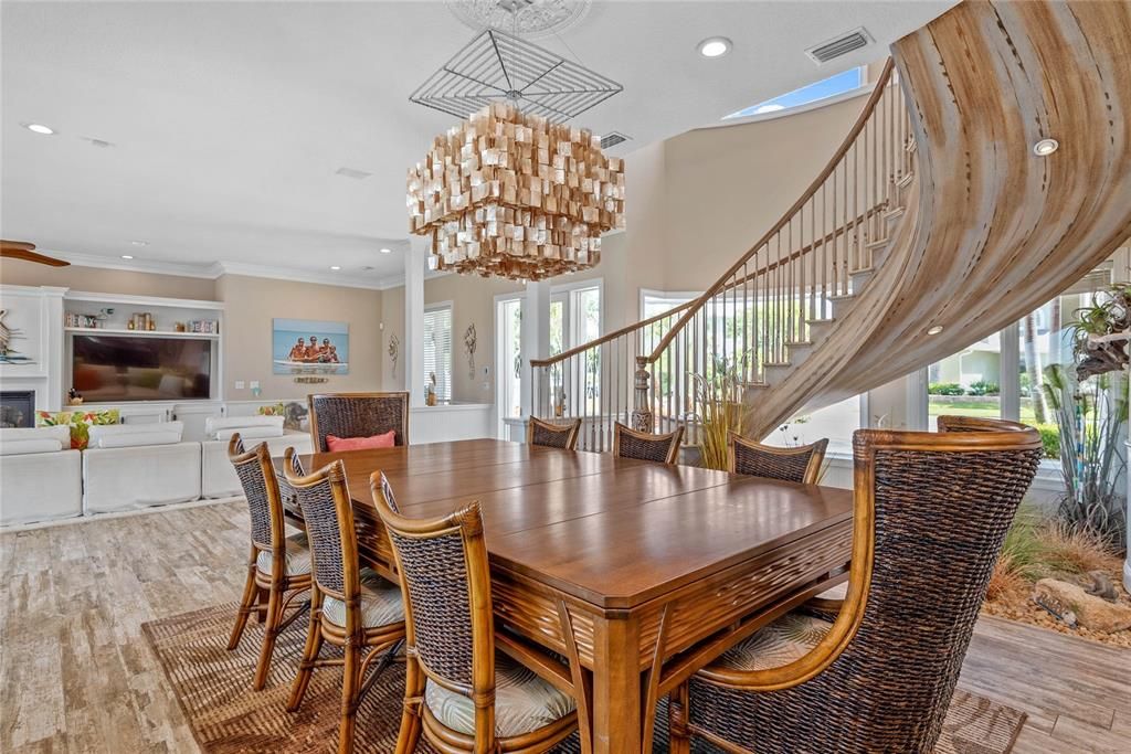 Chandelier, Dining room, Fireplace, Interior, Living room, Recessed Lighting, Wood Texture Flooring